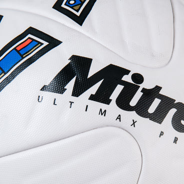 Back ¾ left view of the Mitre Ultimax Pro LE Football White, Red and Blue