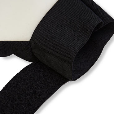 Back ¾ right view of the Mitre Magnetite Junior Unisex Glove Black and White