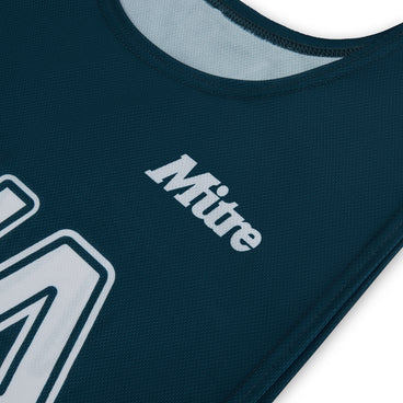 Front ¾ right view of the Mitre Netball Pro Training Bib Set Green and Tidal Teal