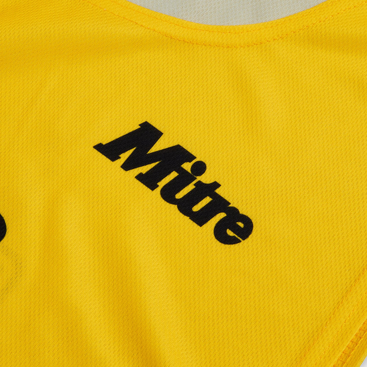 Front ¾ right view of the Mitre Netball Pro Training Bib Set Yellow