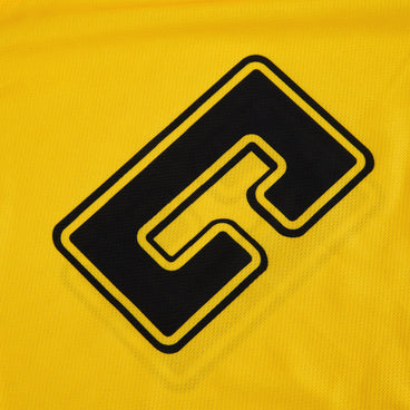 Back ¾ left view of the Mitre Netball Pro Training Bib Set Yellow
