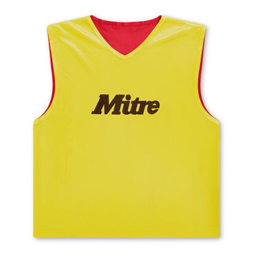 Front ¾ right view of the Mitre Pro Rev Training Bib 24 AU Red and Yellow